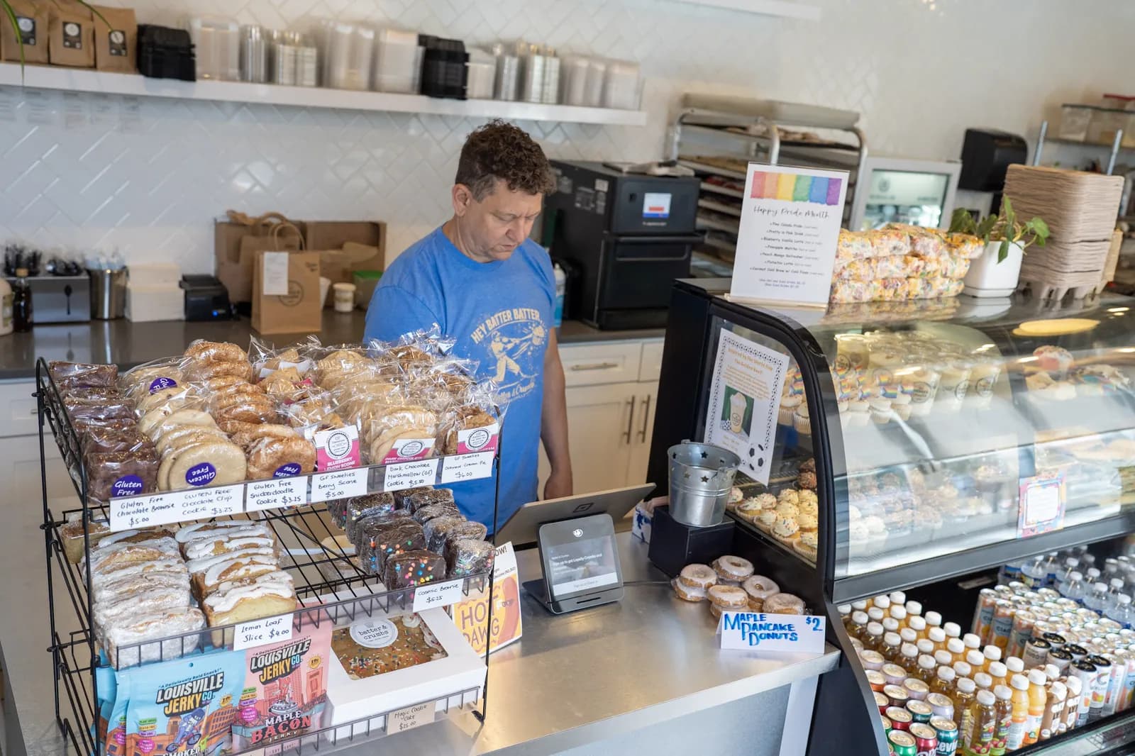 The pastry case and register, stocked for the day