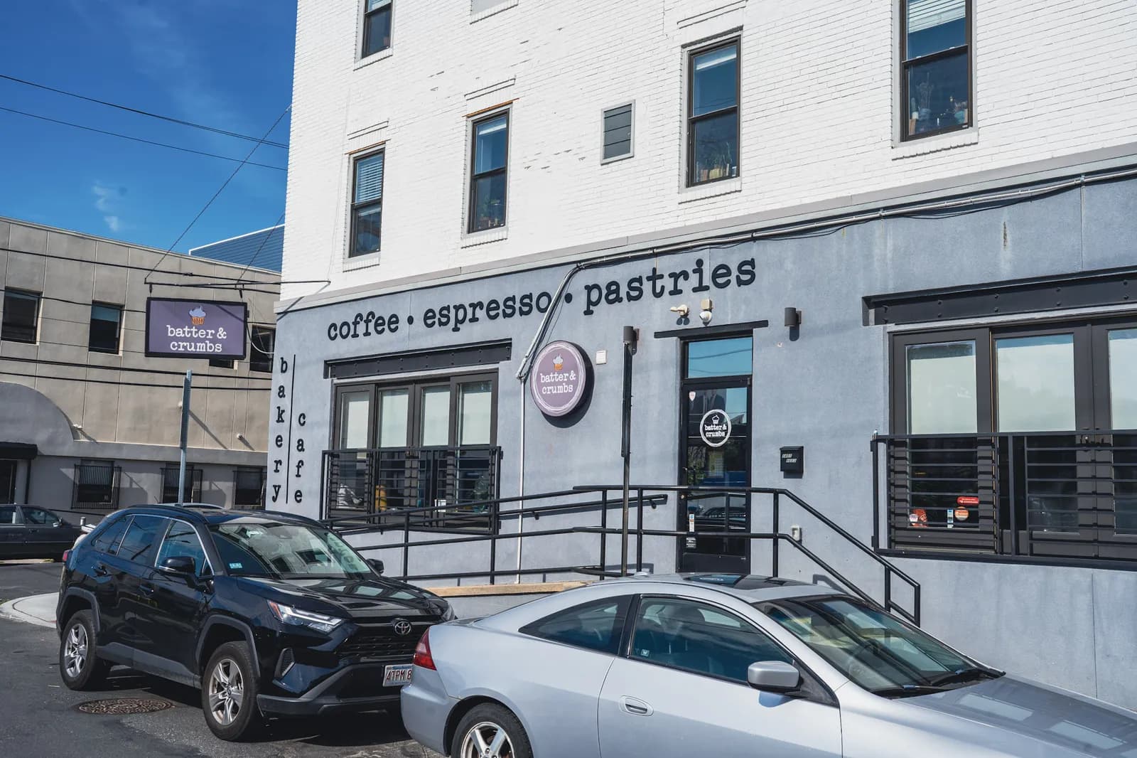 The bakery-cafe signage and front door at 1401 Reed Street
